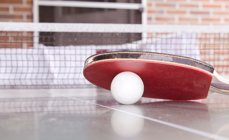 A table tennis ball can fly very fast during a game, but the air drag is a considerable factor in its flight trajectory (along with spin).