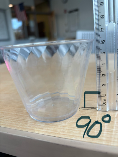 Measure the HEIGHT of this cup first. Make sure to hold the ruler perpendicular to your table or desk! (See pic.)