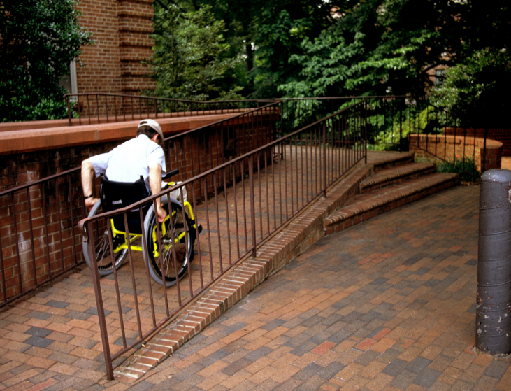 Attribution: Man in Wheelchair on Ramp, by Produced by United States Government / Richard Duncan, MRP, Sr. Project Mgr, North Carolina State University, The Center for Universal Design. Public Domain. publicdomainfiles.com. 